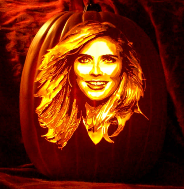 <div class="caption-credit"> Photo by: The Pumpkin Geek</div><b>Heidi Klum</b> <br> I wish there was a Tim Gunn pumpkin to go with the Heidi one. I am so used to seeing them as a duo. I guess she just has to "make it work." <br> <br> <b><i><a rel="nofollow noopener" href="http://www.babble.com/entertainment/12-celebrity-pumpkins-orange-really-is-the-new-black/maria-menounos/?cmp=ELP|bbl||YahooShine||InHouse|101513|PumpkinGeek||famE|" target="_blank" data-ylk="slk:For 5 more celeb carved pumpkins, visit Babble!;elm:context_link;itc:0;sec:content-canvas" class="link ">For 5 more celeb carved pumpkins, visit Babble!</a></i></b>