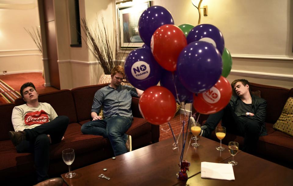 Supporters from the "No" Campaign sleep at the Better Together Campaign headquarters in Glasgow, Scotland