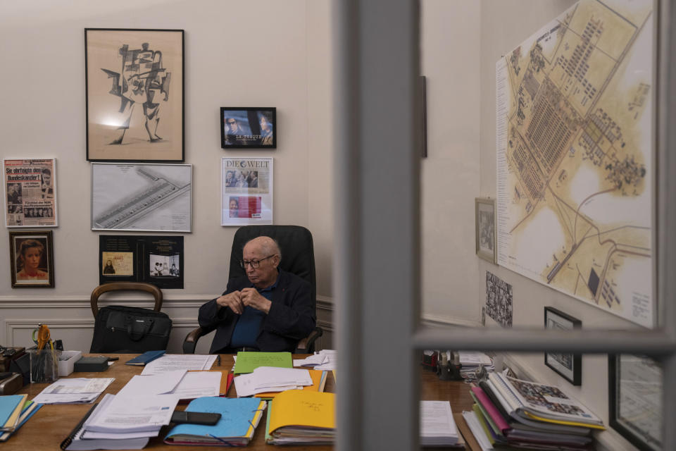 Serge Klarsfeld sits in his office, Tuesday, July 2, 2024 in Paris. France's renowned Nazi hunter Serge Klarsfeld advised voters faced with a duel between a candidate from Marine Le Pen's far-right National Rally and a far-left competitor to choose the far right in Sunday's parliamentary elections runoff. Klarsfeld, a 88 year-old historian who with his wife Beate dedicated his life to bring fugitive Nazis to justice, told the Associated Press "it's very simple. Marine Le Pen is the head of a party which supports Israel and supports the Jews." (AP Photo/Louise Delmotte)