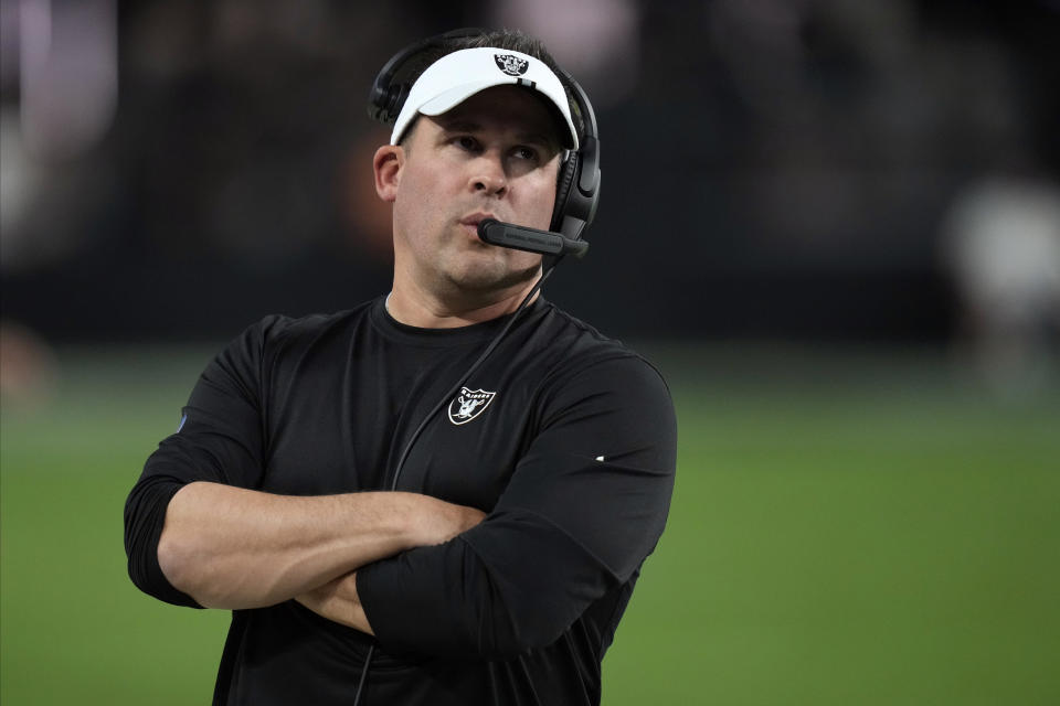 Las Vegas Raiders head coach Josh McDaniels watches during the second half of an NFL preseason football game against the New England Patriots, Friday, Aug. 26, 2022, in Las Vegas. (AP Photo/John Locher)