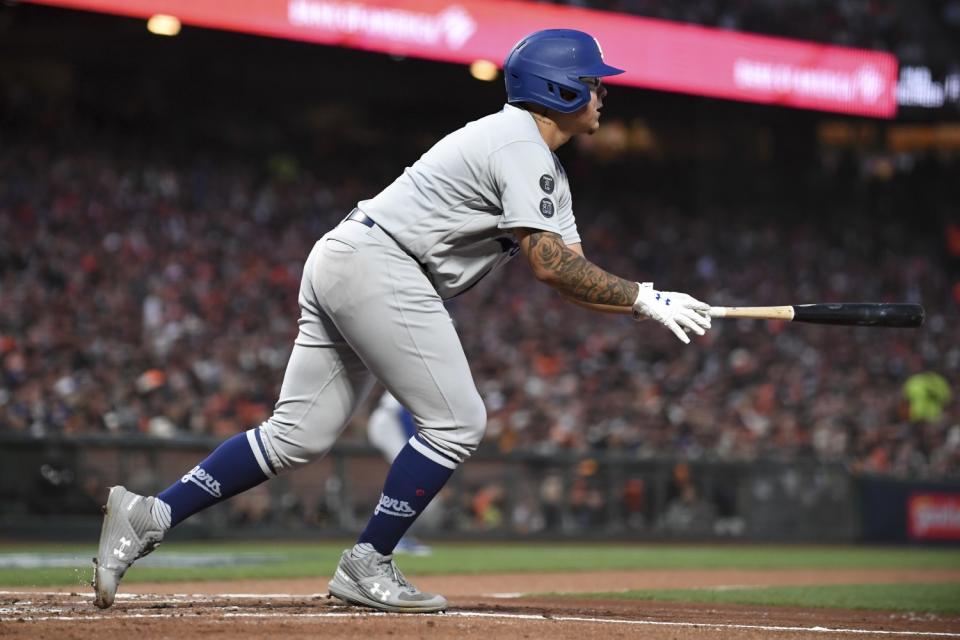 Los Angeles Dodgers' Julio Urias looks up after hitting an RBI single