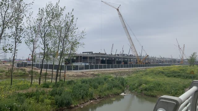 A swamp separated the factory from the main road.