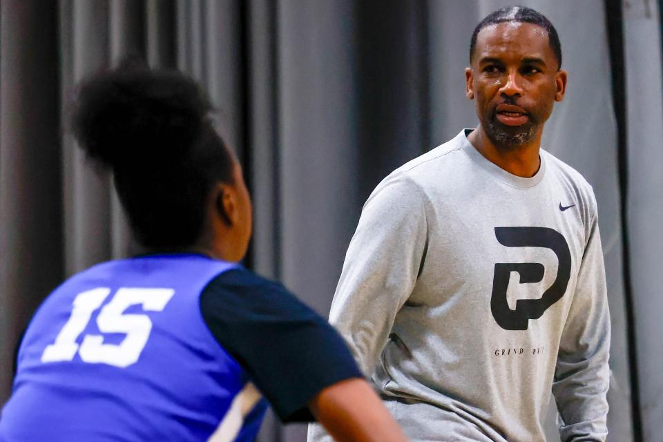 Grind Prep Academy is a basketball-focused prep school optimized to send elite high school hoopers to the college ranks. ABOVE: Coach Carlos Adamson runs drills during practice on April 1.
