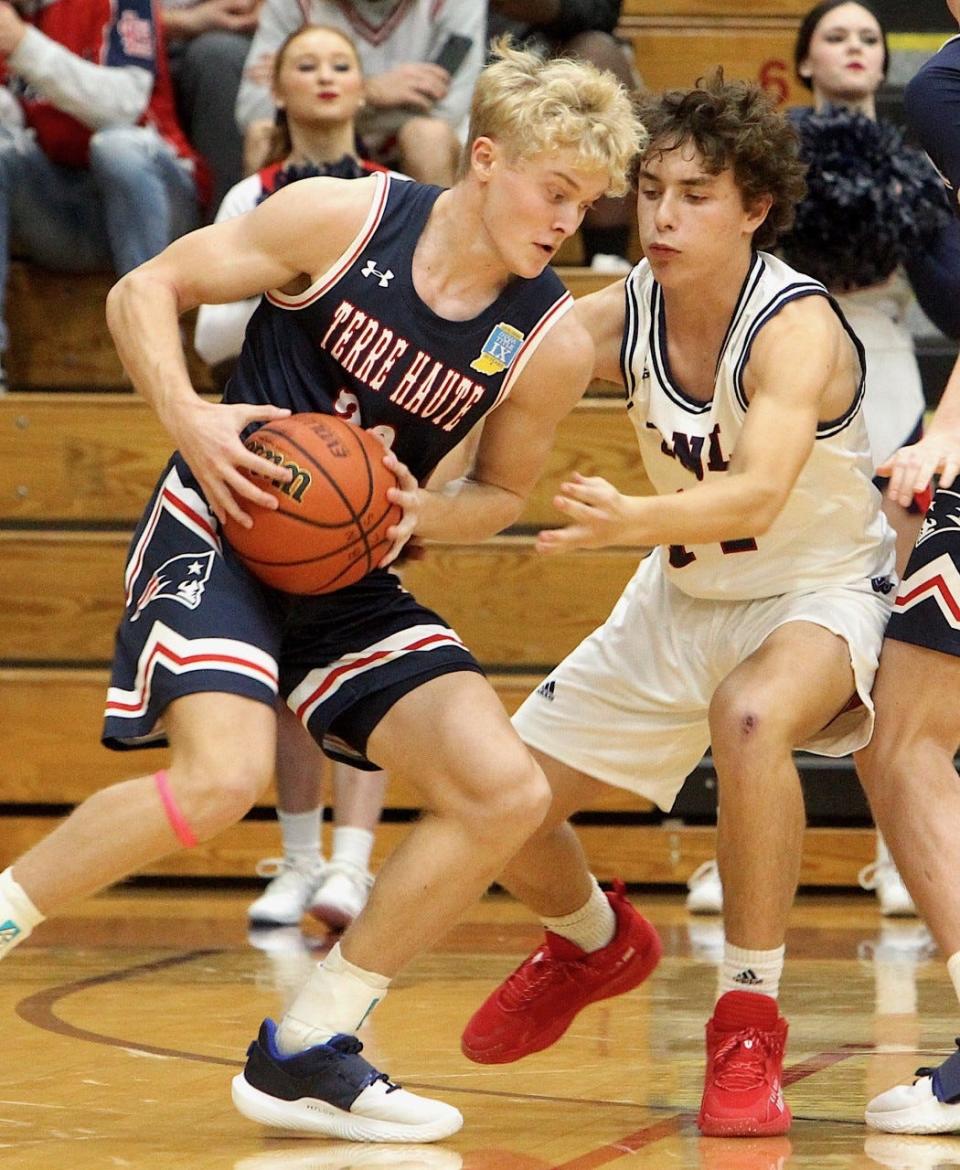 BNL junior guard Kole Bailey pressures Terre Haute North's Bryce Maxwell Saturday night at BNL Fieldhouse.