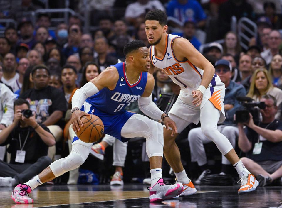 Devin Booker and Russell Westbrook battled all night in the Suns vs. Clippers game Thursday night. Devin Booker's team won the game, 129-124.