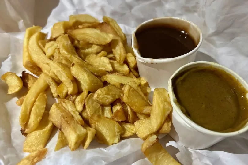 Chips, gravy and curry sauce from Sykes Fish & Chips in Pendlebury