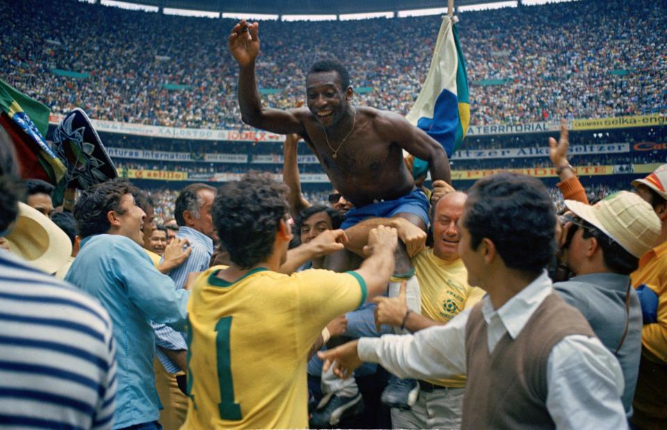 While Pele's three World Cup wins with Brazil as a player (pictured celebrating after winning the 1970 World Cup) likely won't be touched anytime soon, does that automatically cement him as the Greatest? I don't think so.   (AP Photo, file)
