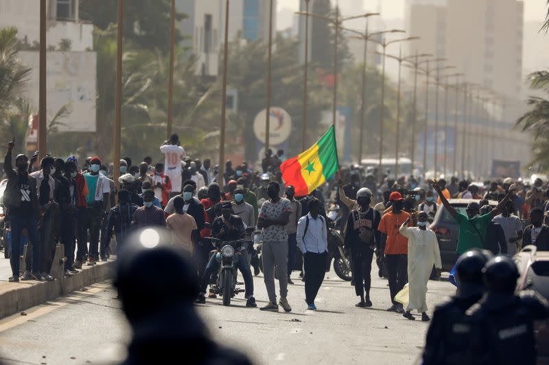 Security forces clash with supporters of opposition leader Ousmane Sonko, in Dakar