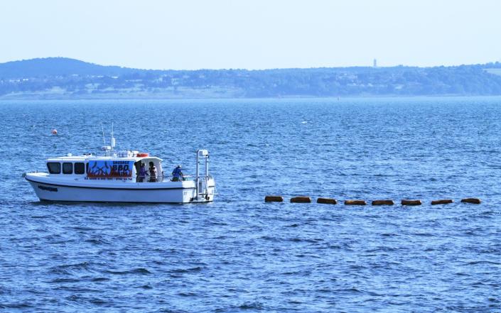 The string of the sausages deployed from a small boat across the Irish Sea border from Scotland to Northern Ireland - News Scan 