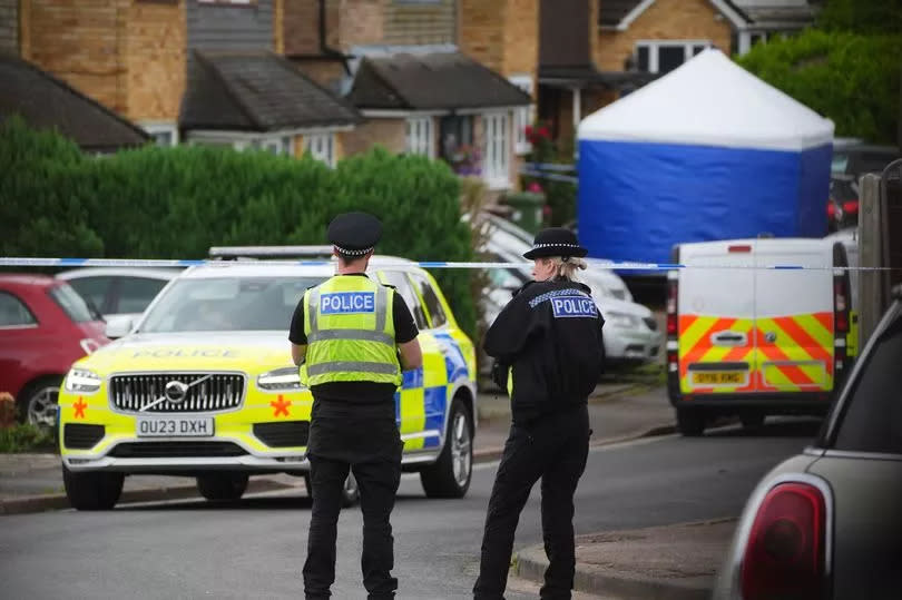 Police at the scene in Ashlyn Close, Bushey, Hertfordshire.