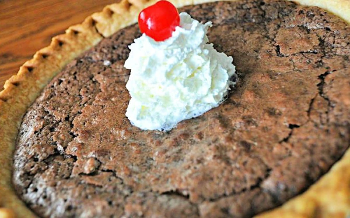 <p>Krista Marshall</p><p>If brownies and a hot fudge sundae combined into a pie crust, this would be the result.</p><p><strong>Get the recipe: <a href="https://parade.com/862569/kristamarshall/fudge-pie/" rel="nofollow noopener" target="_blank" data-ylk="slk:Fudge Pie;elm:context_link;itc:0;sec:content-canvas" class="link rapid-noclick-resp">Fudge Pie</a></strong></p><p><strong>Related: <a href="https://parade.com/849304/felicialim/the-18-best-fudge-recipes-ever/" rel="nofollow noopener" target="_blank" data-ylk="slk:18 Best Fudge Recipes Ever;elm:context_link;itc:0;sec:content-canvas" class="link rapid-noclick-resp">18 Best Fudge Recipes Ever</a></strong></p>