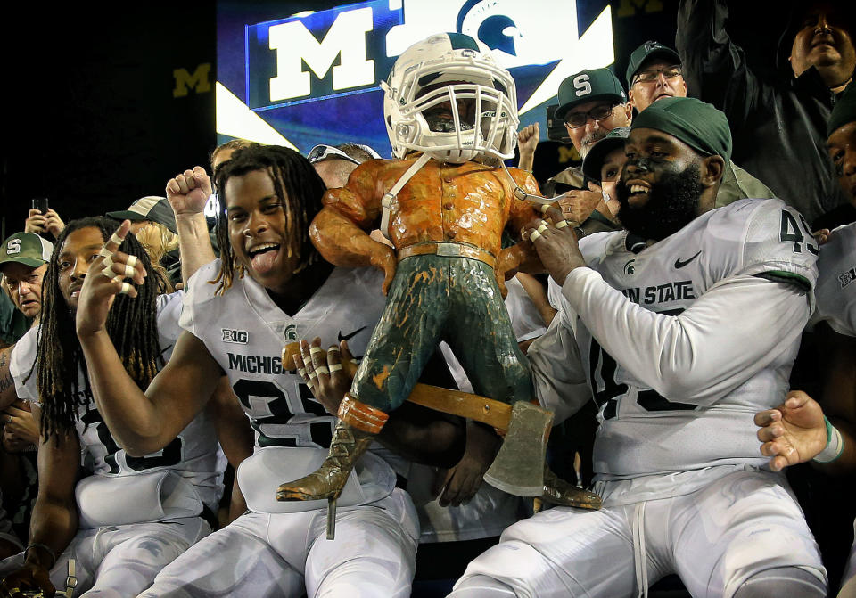 Oct. 7, 2017; Ann Arbor; Michigan State Spartans celebrate a win after a game against the Michigan Wolverines at Michigan Stadium. Mike Carter-USA TODAY Sports