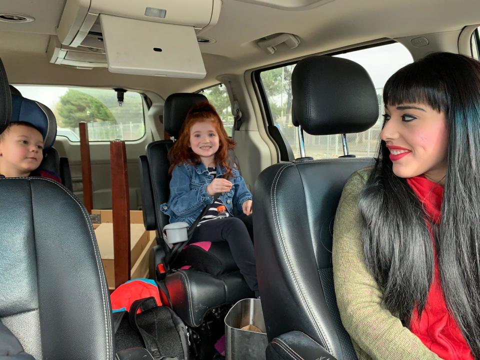 Desiree Alvarez, her 3-year-old son Elijah and 6-year-old daughter Marysol wait in line at a food bank.  / Credit: CBS News