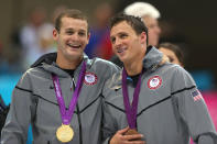 Gold medalist <a href="http://sports.yahoo.com/olympics/swimming/tyler-clary-1135007/" data-ylk="slk:Tyler Clary;elm:context_link;itc:0;sec:content-canvas" class="link ">Tyler Clary</a> of the United States celebrates with bronze medalist <a href="http://sports.yahoo.com/olympics/swimming/ryan-lochte-1132448/" data-ylk="slk:Ryan Lochte;elm:context_link;itc:0;sec:content-canvas" class="link ">Ryan Lochte</a> of the United States following the medal ceremony for the Men's 200m Backstroke final on Day 6 of the London 2012 Olympic Games at the Aquatics Centre on August 2, 2012 in London, England. (Photo by Clive Rose/Getty Images)