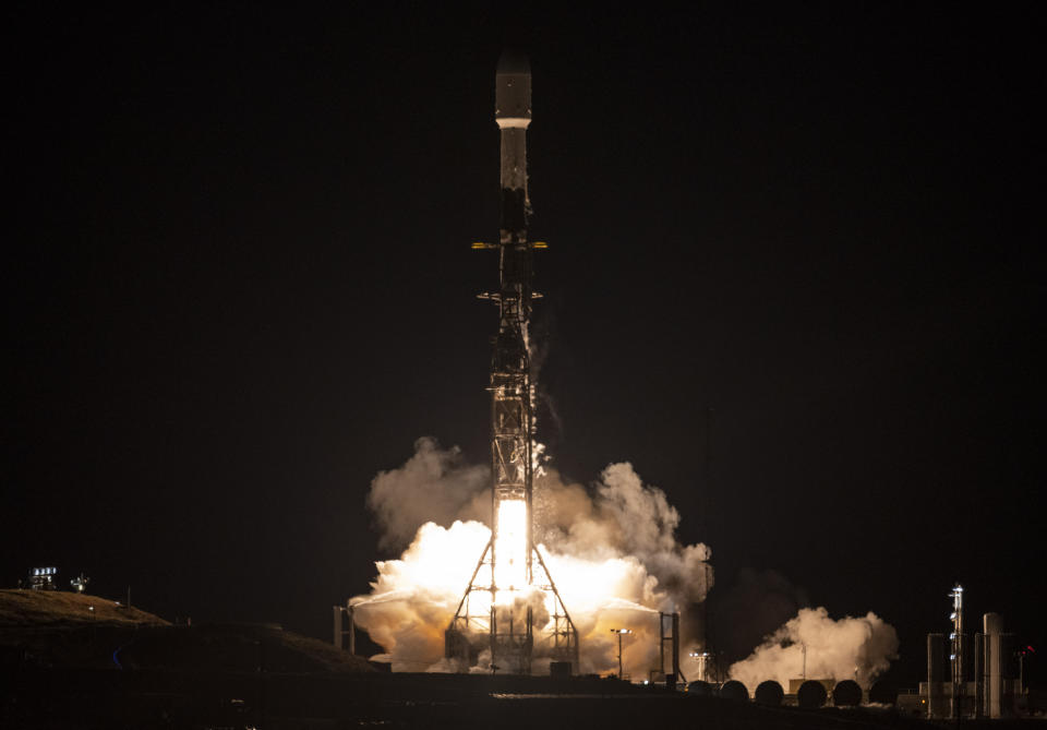 A SpaceX rocket carrying the Surface Water and Ocean Topography satellite lifts off from Vandenberg Space Force Base in California, Friday, Dec. 16, 2022. (Keegan Barber/NASA via AP)