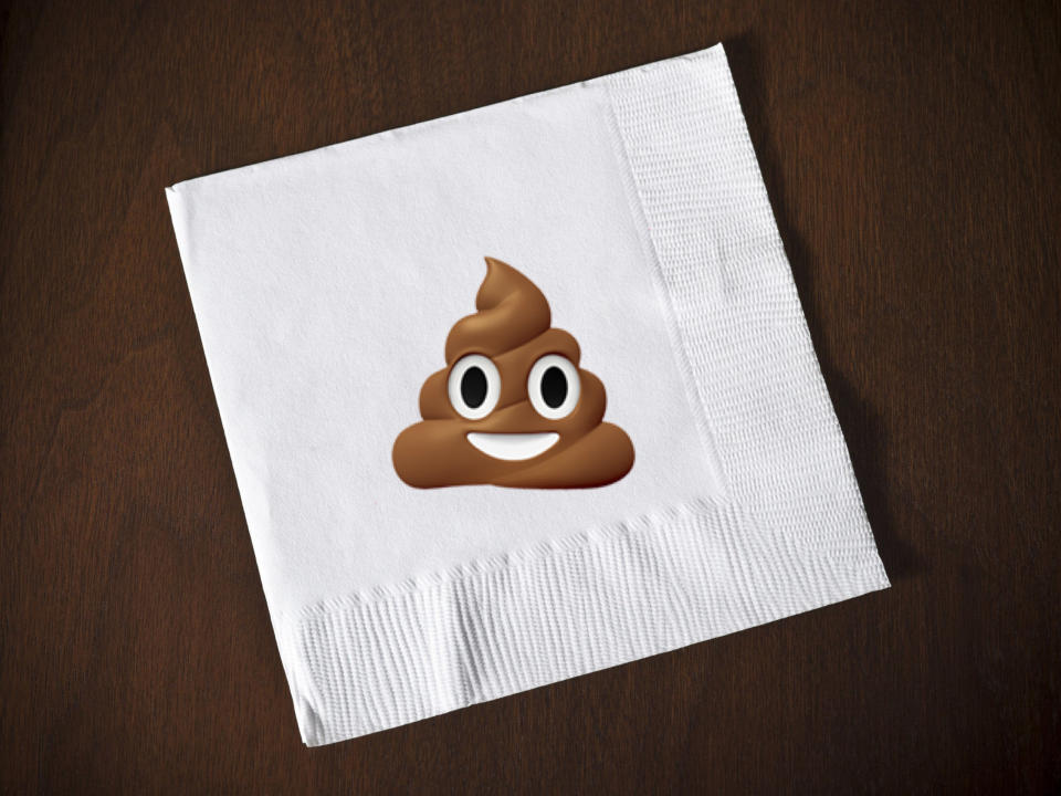 A poop emoji on a napkin
