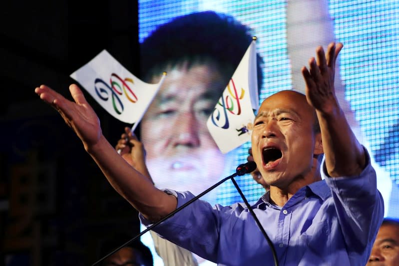 FILE PHOTO: Opposition Nationalist Kuomintang Party (KMT) leader Han Kuo-yu celebrates after winning in local elections in Kaohsiung, Taiwan