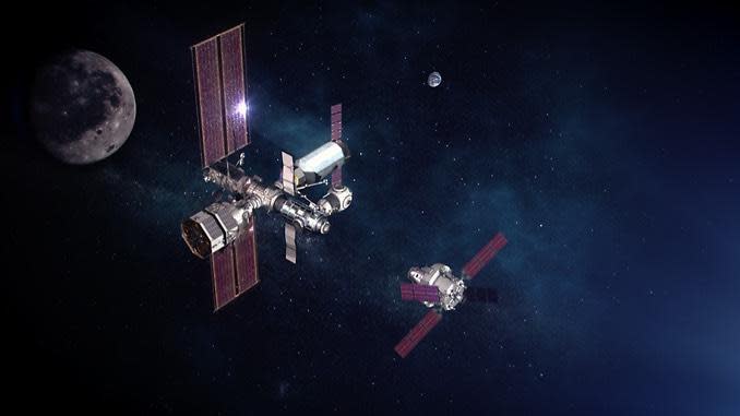 NASA's planned Gateway space station in orbit around the moon would serve as a staging base for Artemis astronauts heading to the surface. In this visualization, an Orion crew capsule is on final approach. / Credit: NASA