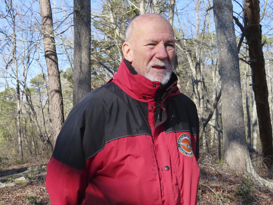 Stewart Farrell stands for a portrait at his home in Port Republic, N.J., on Tuesday, Dec. 27, 2022. Farrell is retiring on Dec. 30, after more than 50 years as one of the nation's leading coastal scientists, whose expertise on the ever-changing shoreline has informed governments, property owners and other scientists. (AP Photo/Wayne Parry)