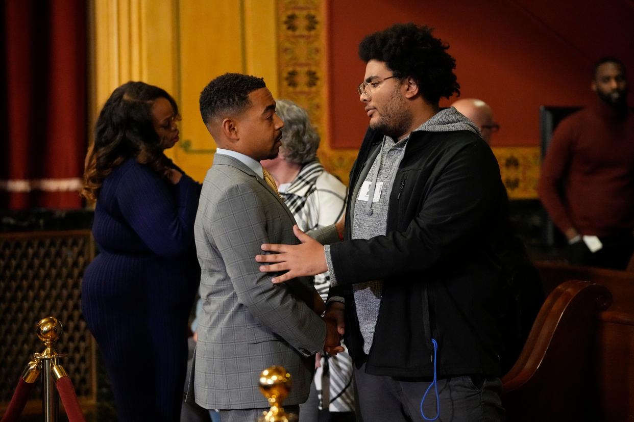 Columbus City Council president Shannon Hardin speaks to Ramon Obey II, president of JUST 614, on Monday at City Hall.