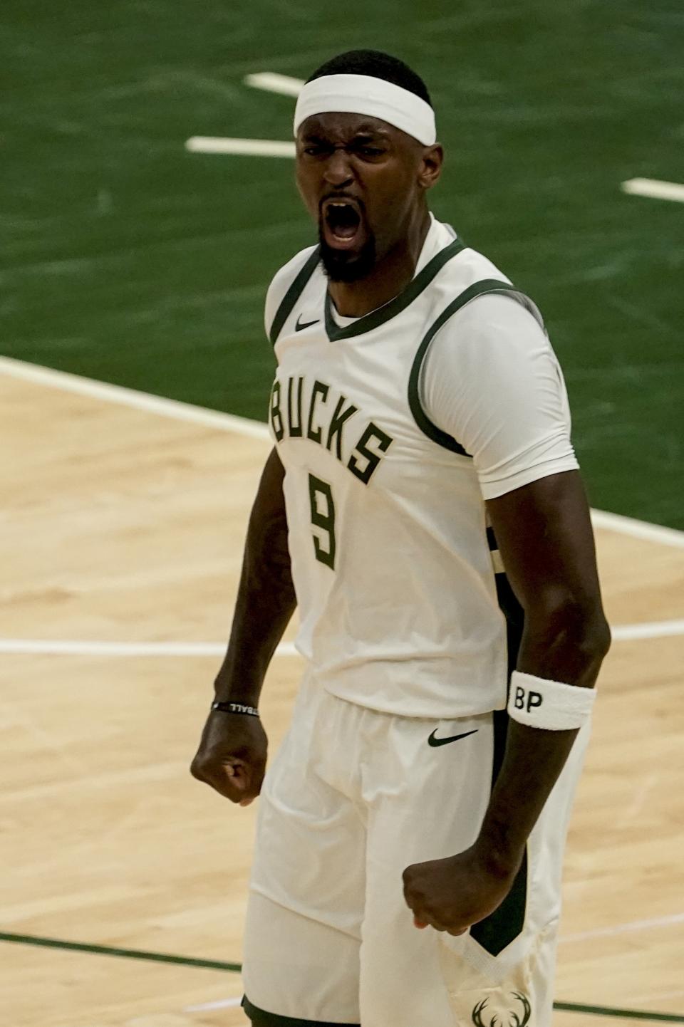 Milwaukee Bucks' Bobby Portis reacts after his dunk during the first half of an NBA basketball game against the Miami Heat Saturday, May 15, 2021, in Milwaukee. (AP Photo/Morry Gash)