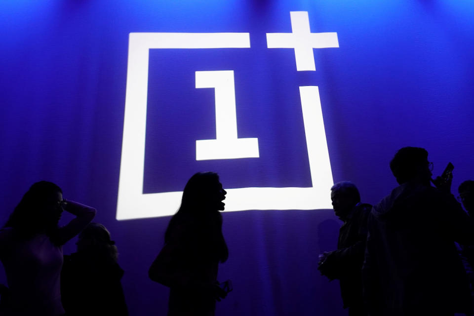 The OnePlus logo is projected onto a wall during a launch event for the new OnePlus 6T in the Manhattan borough of New York, New York, U.S., October 29, 2018. REUTERS/Carlo Allegri - RC1DFE486300
