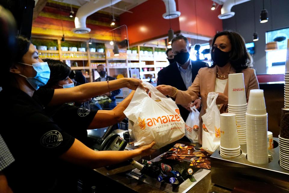 Democratic vice presidential candidate Sen. Kamala Harris, D-Calif., and her husband Douglas Emhoff pick up food at Amaize restaurant Thursday, Sept. 10, 2020, in Doral, Fla.