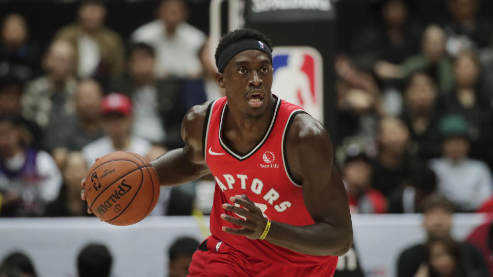 Toronto Raptors' Pascal Siakam dribbles the ball during the first half of an NBA preseason basketball game against the Houston Rockets Tuesday, Oct. 8, 2019, in Saitama, near Tokyo. (AP Photo/Jae C. Hong)