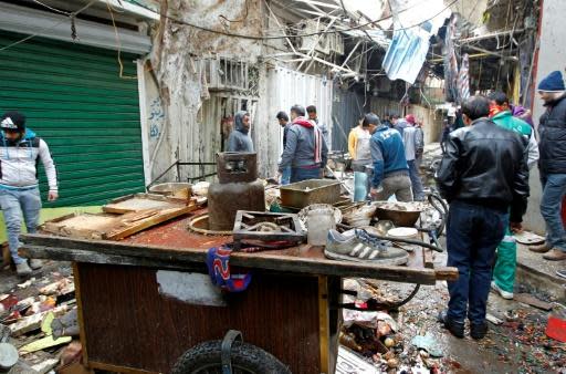Central Baghdad market blasts kill dozens