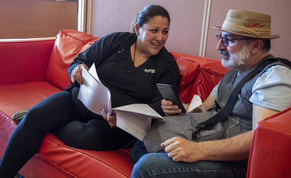 Yelyna De Leon, left, looks over a script with Edward Padilla at Casa 0101 Saturday, July 31, 2021 in Boyle Heights