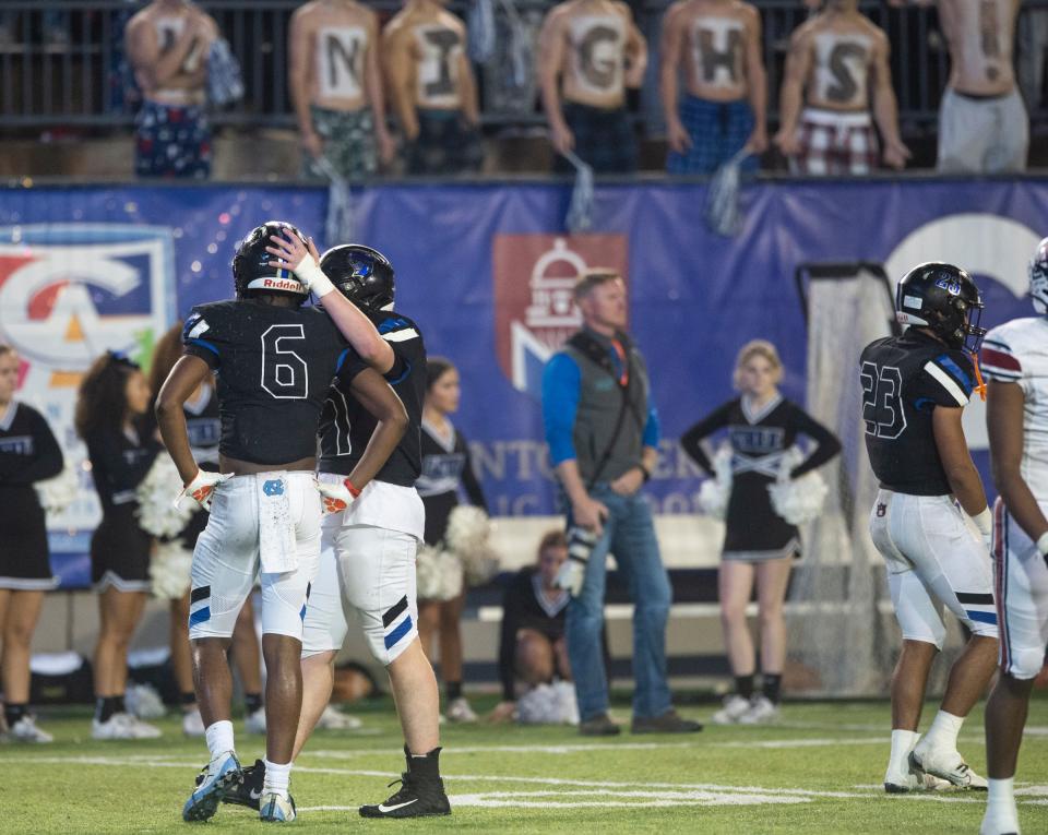 Montgomery Catholic players react after the final offensive play at Cramton Bowl in Montgomery, Ala., on Friday, Nov. 25, 2022. Andalusia defeated Montgomery Catholic 29-26. 