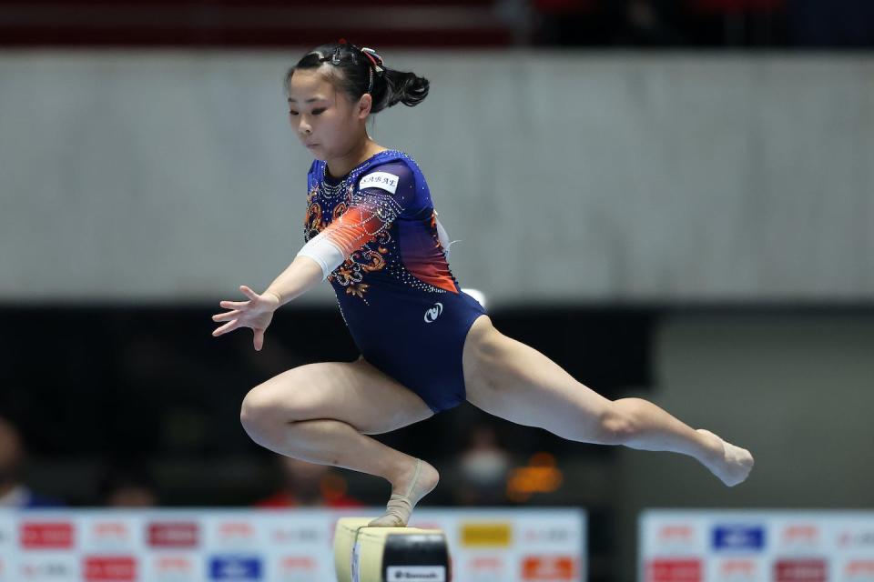 Gymnast Misaki Masui of Japan demonstrated her athletic skills on the balance beam during a June 2023 national competition in Tokyo. <a href="https://www.gettyimages.com/detail/news-photo/misaki-masui-competes-in-the-womens-balance-beam-final-on-news-photo/1258615102?adppopup=true" rel="nofollow noopener" target="_blank" data-ylk="slk:Kiyoshi Ota/Getty Images AsiaPac via Getty Images;elm:context_link;itc:0;sec:content-canvas" class="link ">Kiyoshi Ota/Getty Images AsiaPac via Getty Images</a>