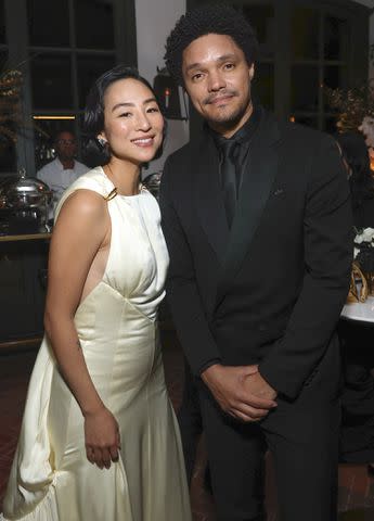 <p>Emma McIntyre/Getty Images </p> Greta Lee and Trevor Noah