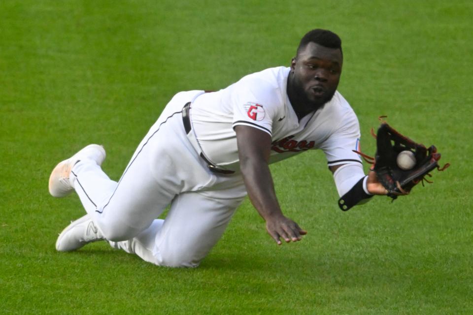 Guardians right fielder Jhonkensy Noel makes a diving catch in the fourth inning against the Cubs, Aug. 14, 2024, in Cleveland.