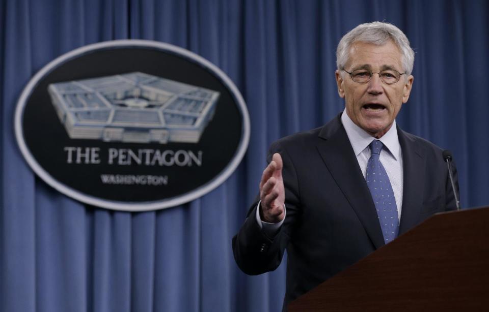 Defense Secretary Chuck Hagel briefs reporters at the Pentagon, Monday, Feb. 24, 2014, where he recommended shrinking the Army to its smallest size since the buildup to U.S. involvement in World War II in an effort to balance postwar defense needs with budget realities. (AP Photo/Carolyn Kaster)