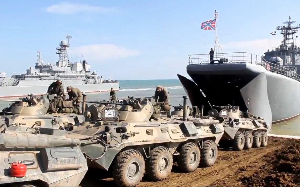 In April, Russia ordered troops back from occupied Crimea in an attempt to dial down fears of an imminent invasion - Russian Defense Ministry Press Service via AP