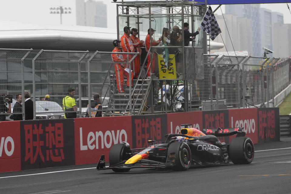 Red Bull driver Max Verstappen of the Netherlands crosses the finish line to win the Chinese Formula One Grand Prix at the Shanghai International Circuit, Shanghai, China, Sunday, April 21, 2024. (AP Photo/Andy Wong)