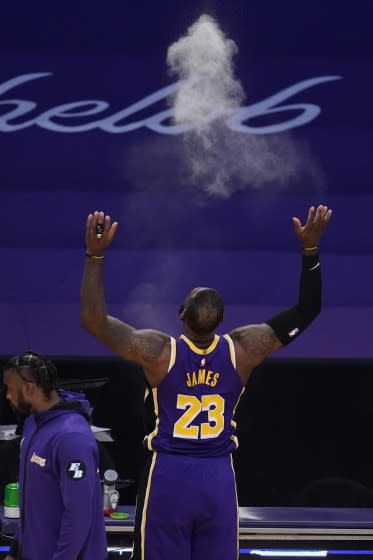 LeBron James limps off floor with injury as Lakers season hits new low