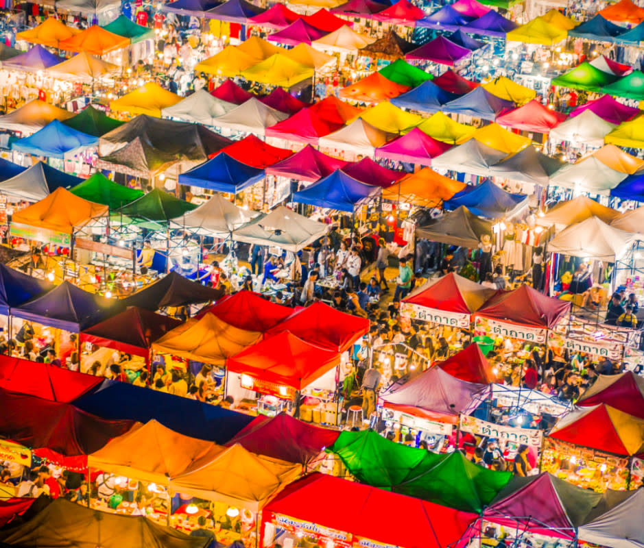 Bangkok's Rod Fai market is one of several sensory overload stops spread throughout Thailand's colorful capital. <p>Getty Images</p>