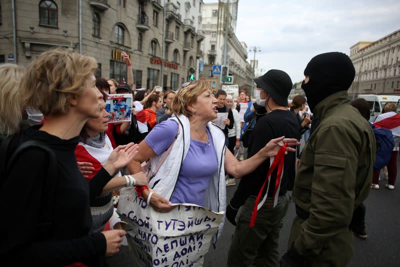 Women take part in a rally against police brutality following protests to reject the presidential election results in Minsk