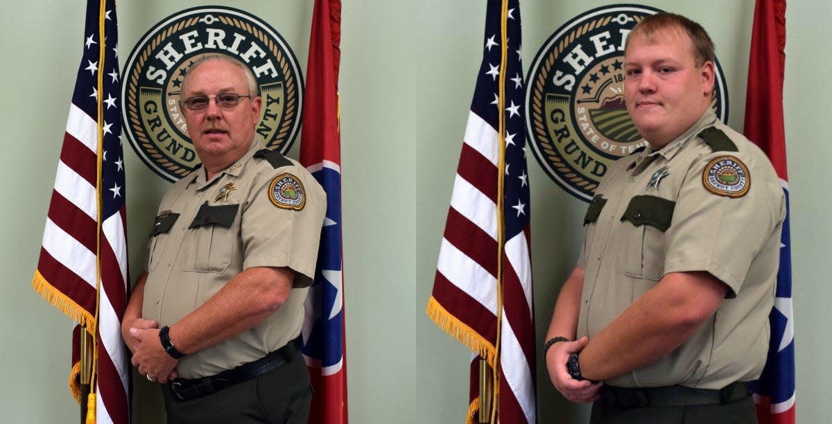 Grundy County Sheriff's Office Chief Deputy Tony Bean (left) and his son, Sgt. T.J. Bean, pose for their official sheriff's office portraits.