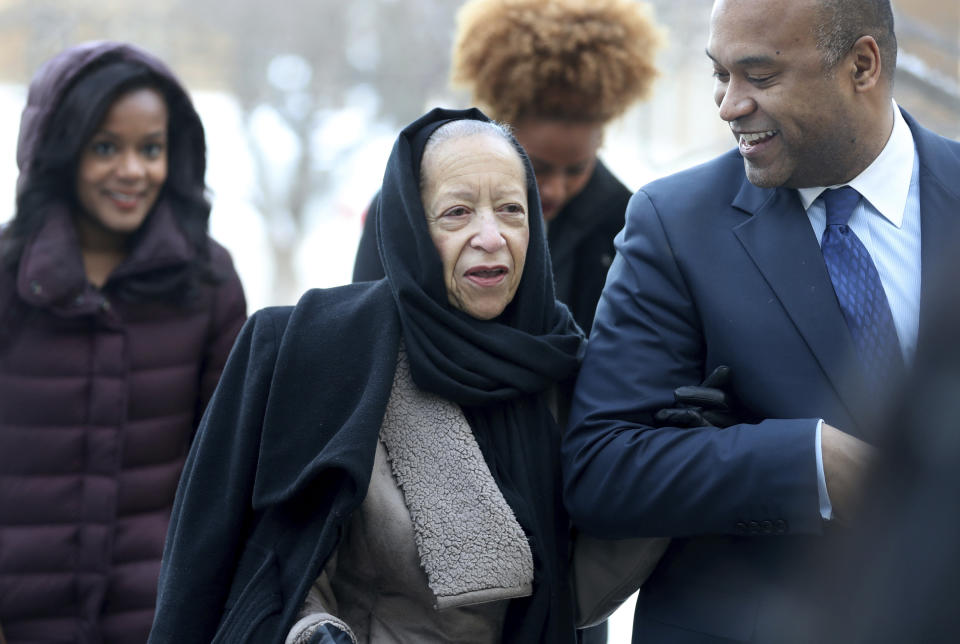 Prince's half-sister Norrine Nelson, center, arrives at the Carver County Justice Center for a hearing on her brother's estate Thursday, Jan. 12, 2017, in Chaska, Minn. All the siblings want the judge to declare the trust company Comerica as a "personal representative," or executor, of the estate. But they're divided on whether to name anyone as co-executor. Four of the six siblings back longtime Prince lawyer L. Londell McMillan. But Tyka Nelson and Omar Baker object. (David Joles/Star Tribune via AP)