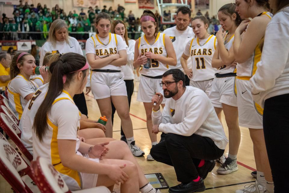 Central Head Coach David Alexander gives direction during a timeout as the Central Bears play the North Huskies during the semifinal round of the 2023 IHSAA Class 4A Girls Basketball Sectional at Harrison High School in Evansville, Ind., Friday, Feb. 3, 2023. 