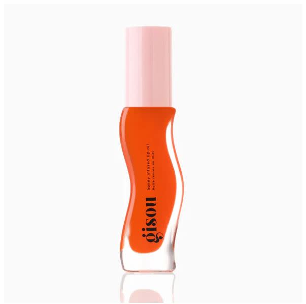 A tinted, fruit-scented Honey Infused Lip Oil from Gisou.