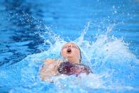 <p>USA's Phoebe Bacon competes in the final of the women's 200m backstroke swimming event during the Tokyo 2020 Olympic Games at the Tokyo Aquatics Centre in Tokyo on July 31, 2021. (Photo by Oli SCARFF / AFP)</p> 