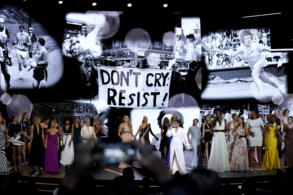 Mickey Guyton, center, performs "What Are You Gonna Tell Her?" while accompanied by female athletes at the ESPY Awards on Wednesday, July 20, 2022, at the Dolby Theatre in Los Angeles. (AP Photo/Mark Terrill)