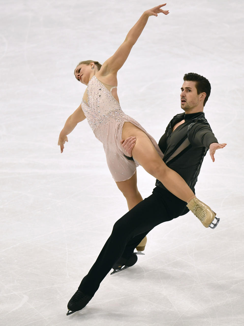 Madison Hubbell and Zachary Donohue of the USA perform during the Ice Dance-Free Dance at the Figure Skating World Championships in Stockholm, Sweden, Saturday, March 27, 2021. (AP Photo/Martin Meissner)