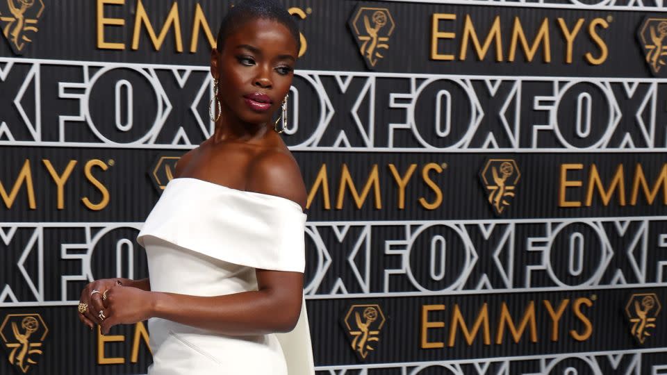 “Dear White People” and “Wednesday” actor Joy Sunday wore a white off-shoulder white tunic with double train and matching pants by Safiyaa. - Kevin Mazur/Getty Images