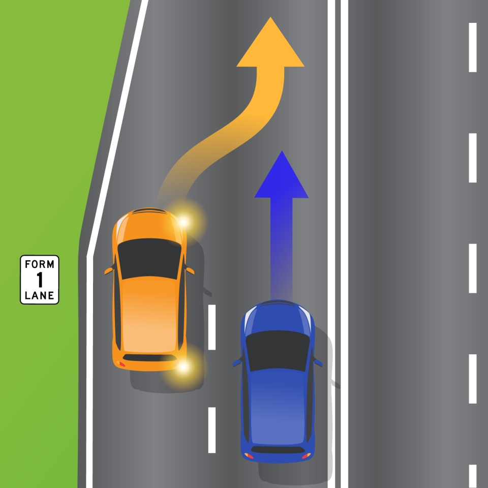 Two cars are pictured zipper merging.