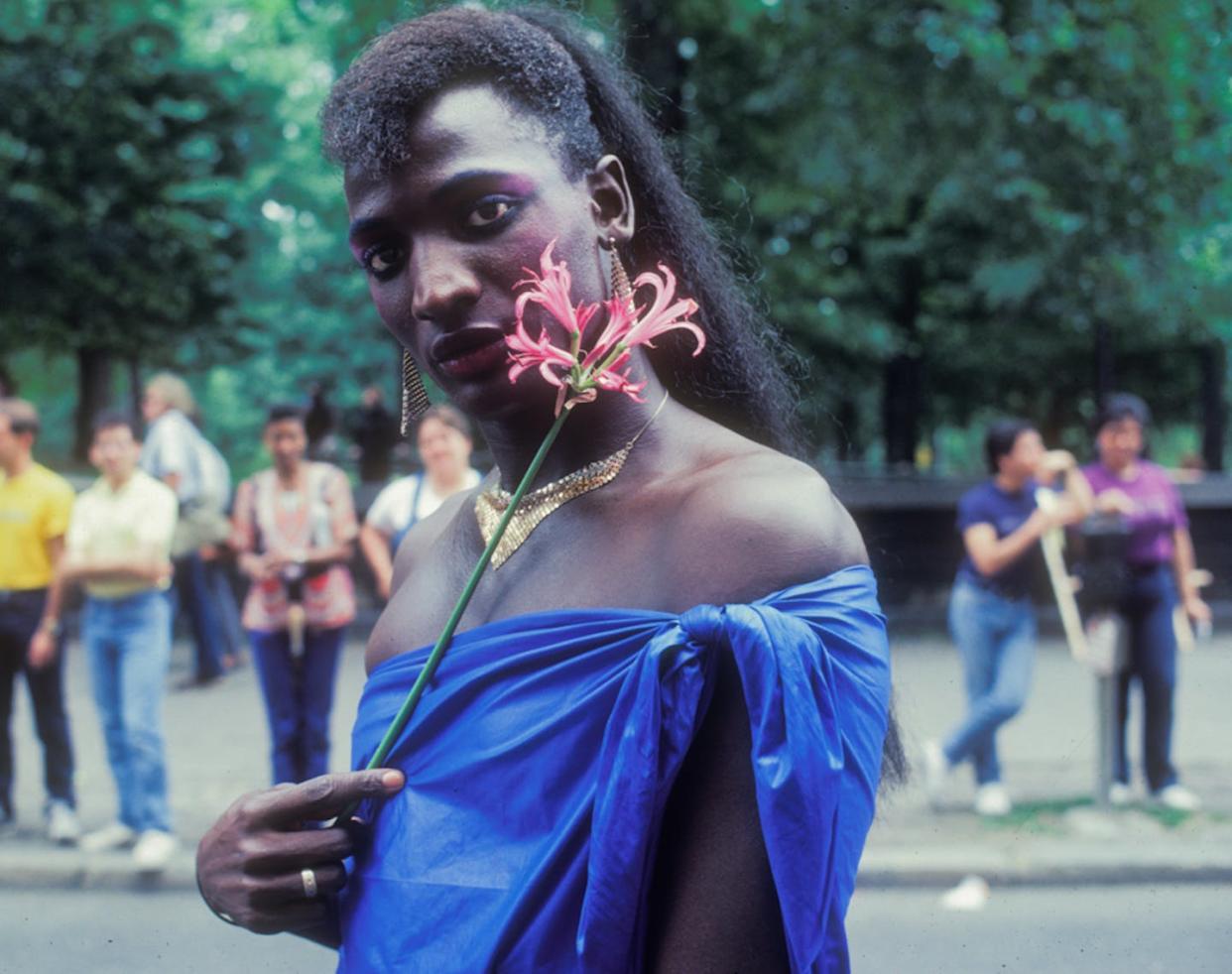 An unidentified participant in a New York City Pride March during the 1980s. <a href="https://www.gettyimages.com/detail/news-photo/portrait-of-an-unidentified-participant-dressed-in-a-blue-news-photo/1250531142?adppopup=true" rel="nofollow noopener" target="_blank" data-ylk="slk:Mariett Pathy Allen/Getty Images;elm:context_link;itc:0;sec:content-canvas" class="link ">Mariett Pathy Allen/Getty Images</a>